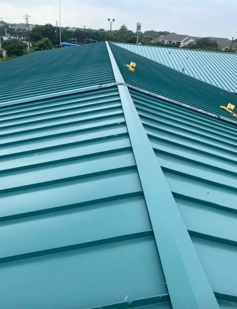 Green commercial metal roof ridge and valley for Metal Roof Repair in Sayre